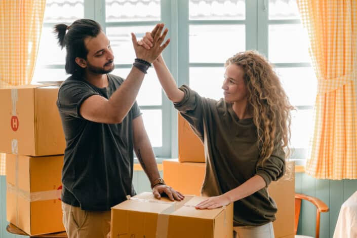 Couple doing a high-five.