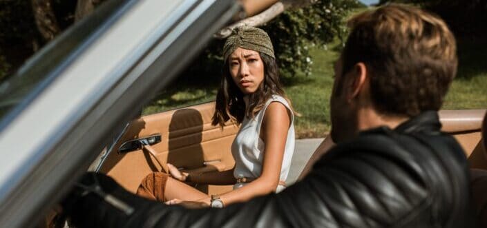 A Couple Having A Serious Argument Inside A Car.
