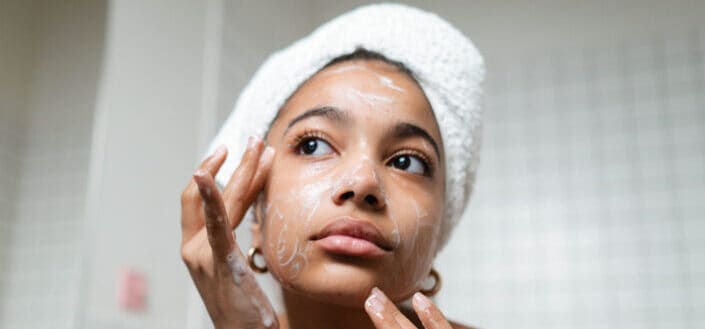Woman Washing Her Face With Soap