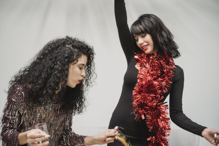 Two drunk ladies enjoying themselves