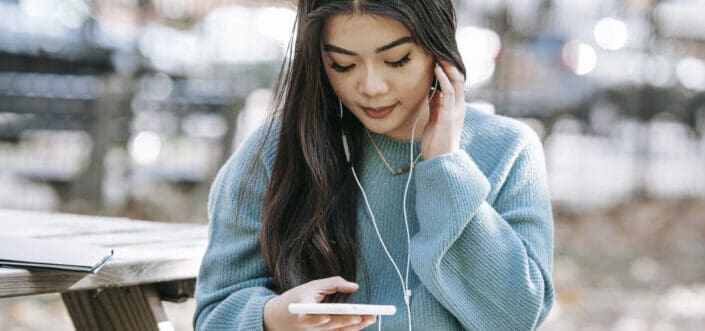 Woman listening at here phone