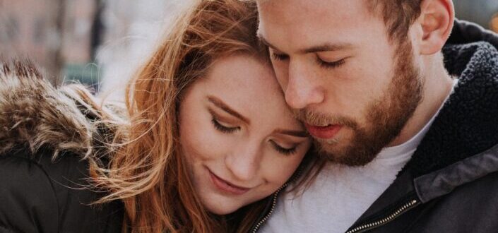 Man and woman cuddling