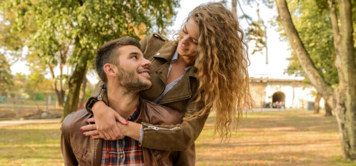 woman hugging his man from behind