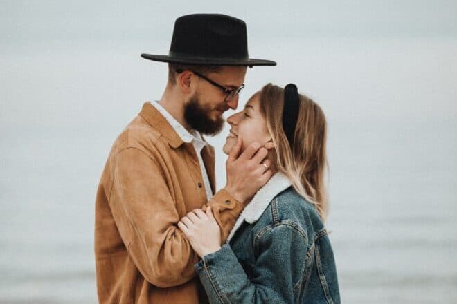 couple looking at each other - ways your brain falls in love