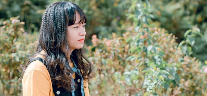 A sad looking woman having deep thoughts 