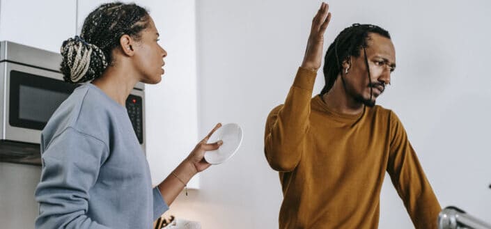 couple arguing in their kitchen