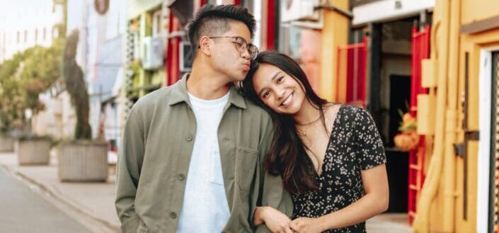 Asian couple being playful