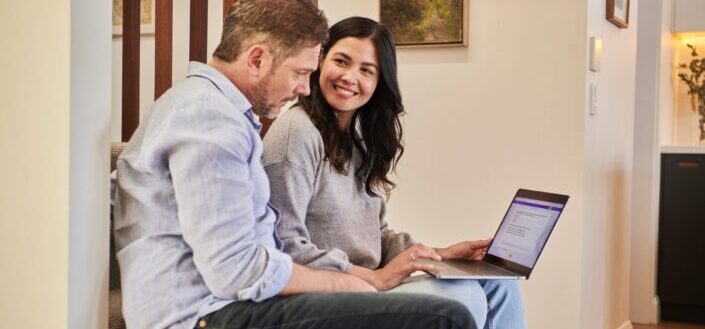 Woman looking amazed at his male colleague