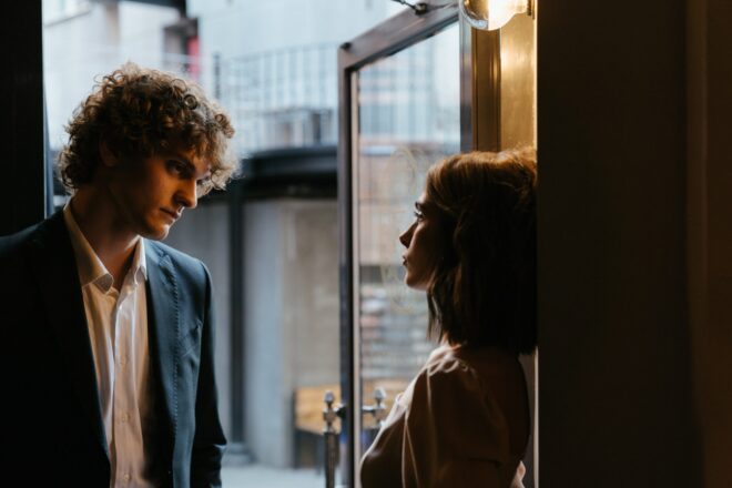 Man looking fiercely at woman - How to seduce a man