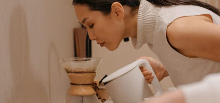 Woman Making Pour Over Coffee