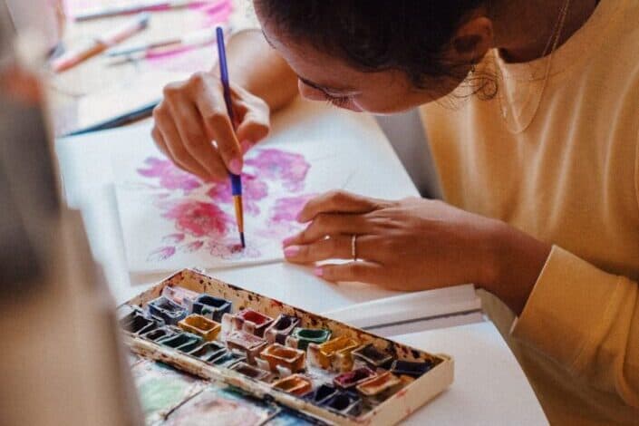 ethnic woman doing art 