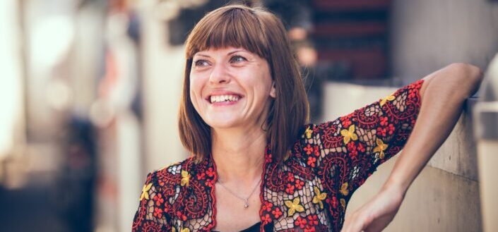 woman smiling and is happy