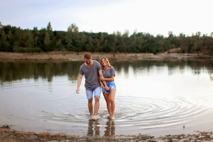 Couple enjoying each other in the river.