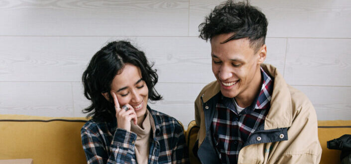 Couple Sitting Closely Together