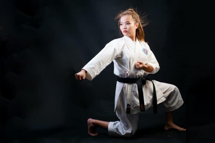 Black Belt Woman Doing Martial Arts