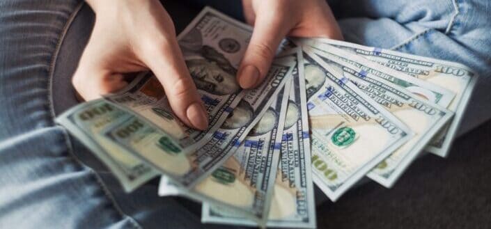 Holding a Fan of Money