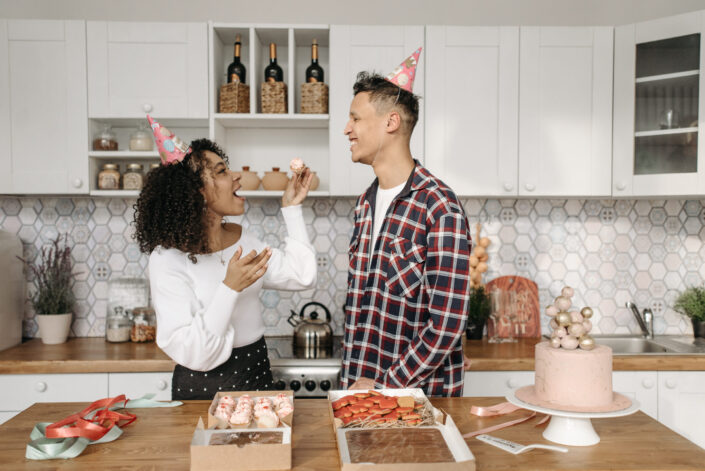 Couple Eating Dessert While Celebrating