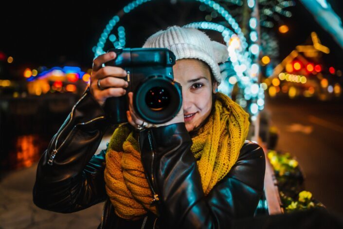 Woman With Her Camera Taking a Picture