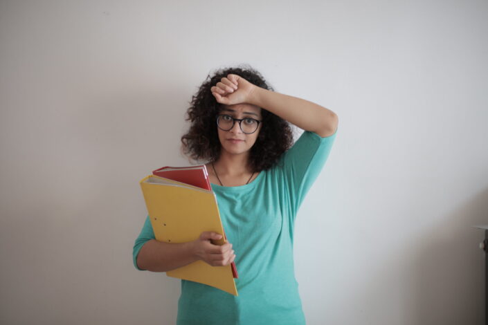 Tired looking busy woman