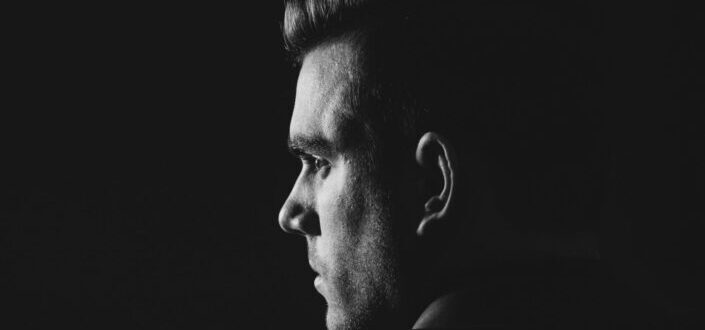 Man Wearing a Suit Looking to His Left