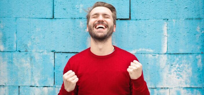 Man With His Fists Closed in Happiness
