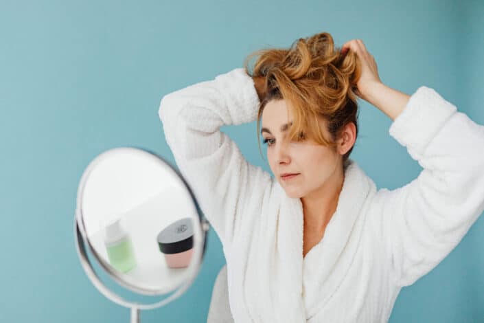 Woman in Bathrobe Getting Ready