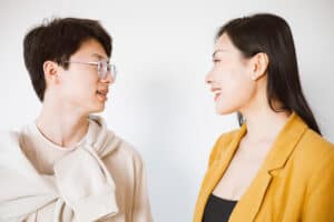 Man and woman talking - featured