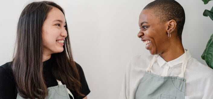 photo-of-two-women-laughing-stockpack-pexels
