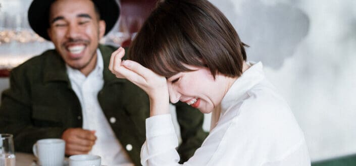 Woman Bursting Into Laughter