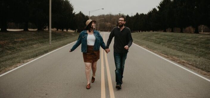 couple walking on road