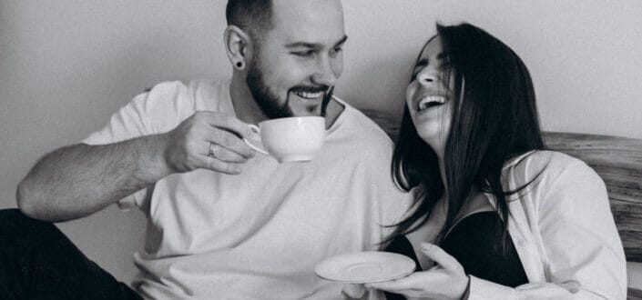 Couple having fun while drinking coffee