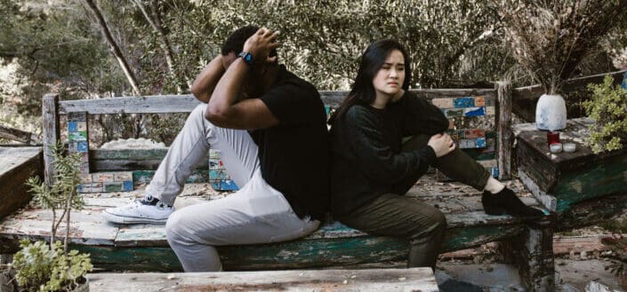 Couple Having an Argument on an Outdoor Bench