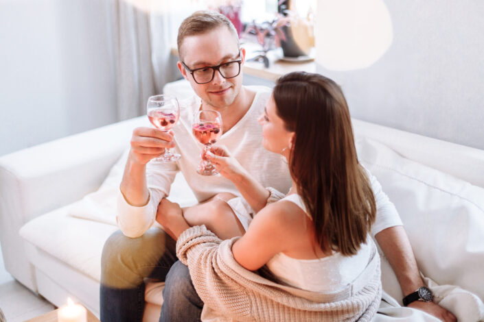 a couple having conversation while having a drink