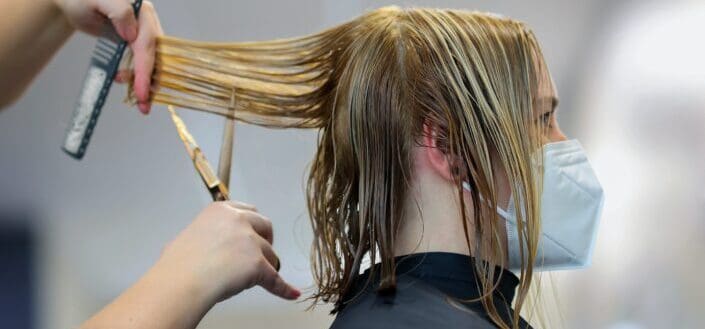 stylist working the clients hair 