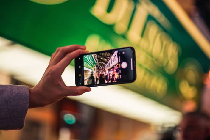 a woman taking a picture