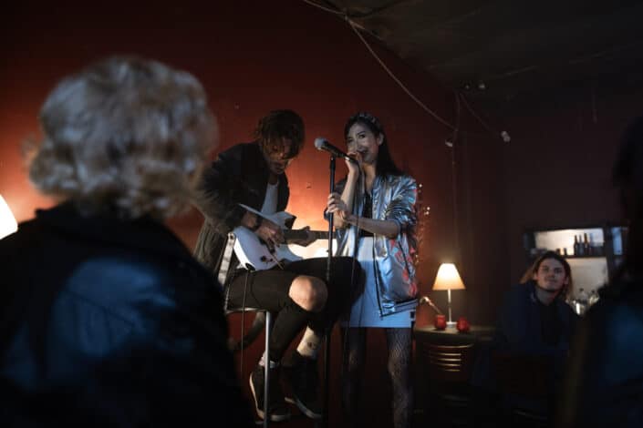 a woman performing on stage