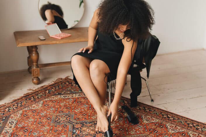 woman wearing a black dress