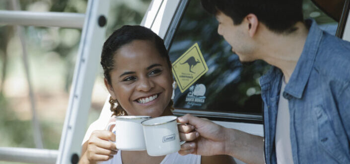 a girl smiling while talking with the guy