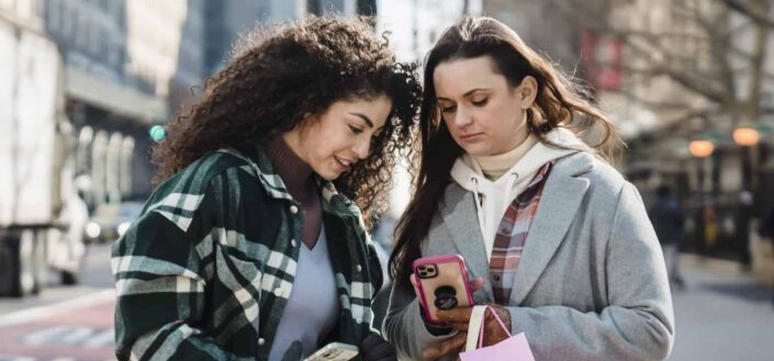Two Girls Holding a Shopping Bag 