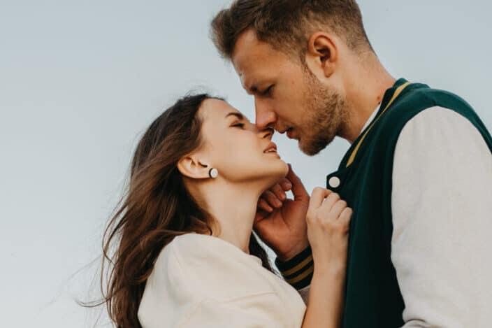 Loving couple kissing on street