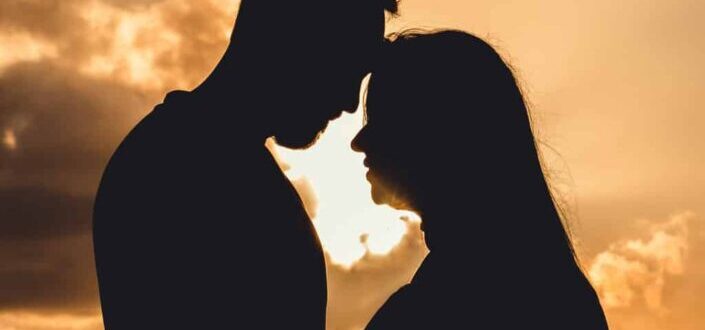 Silhouette of a couple in evening