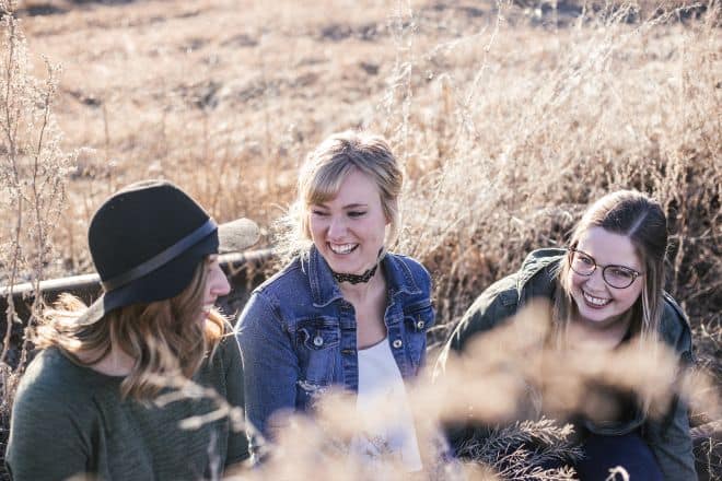 three women taking groupie - Silly Questions To Ask