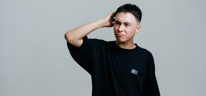 A man in black crew neck t shirt