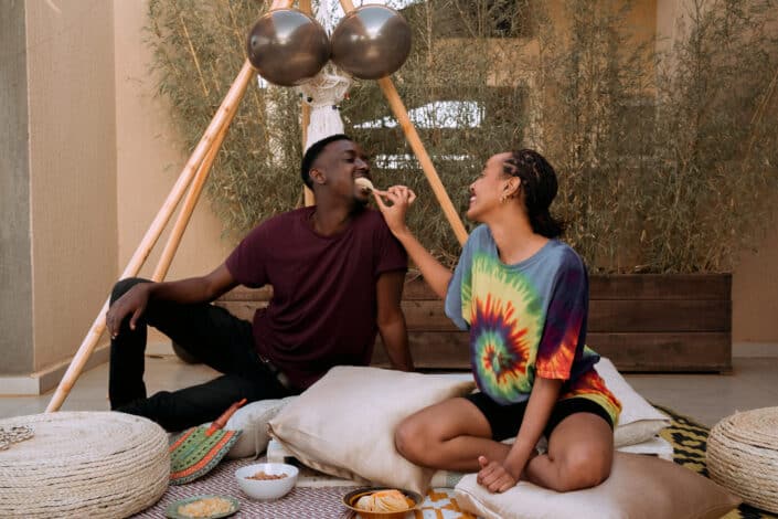 woman feeding her man