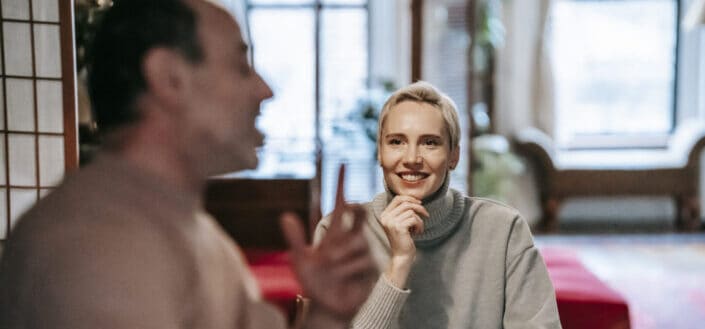 man talking to his wife