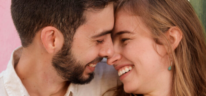 Happy Couple Facing Each Other