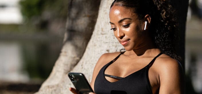 a woman holding cellphone