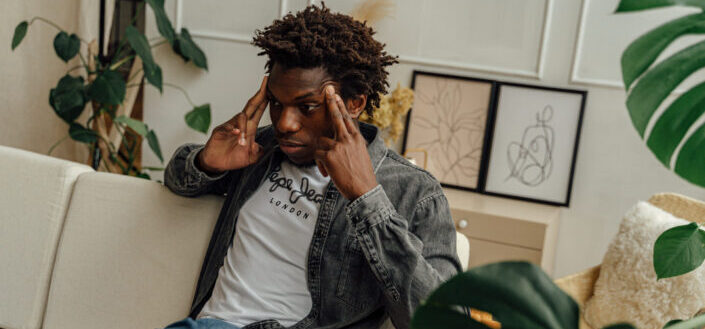 Man in a Denim Jacket Thinking