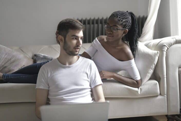 Couple wearing white tops