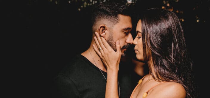 Woman Embracing Boyfriend Outdoors